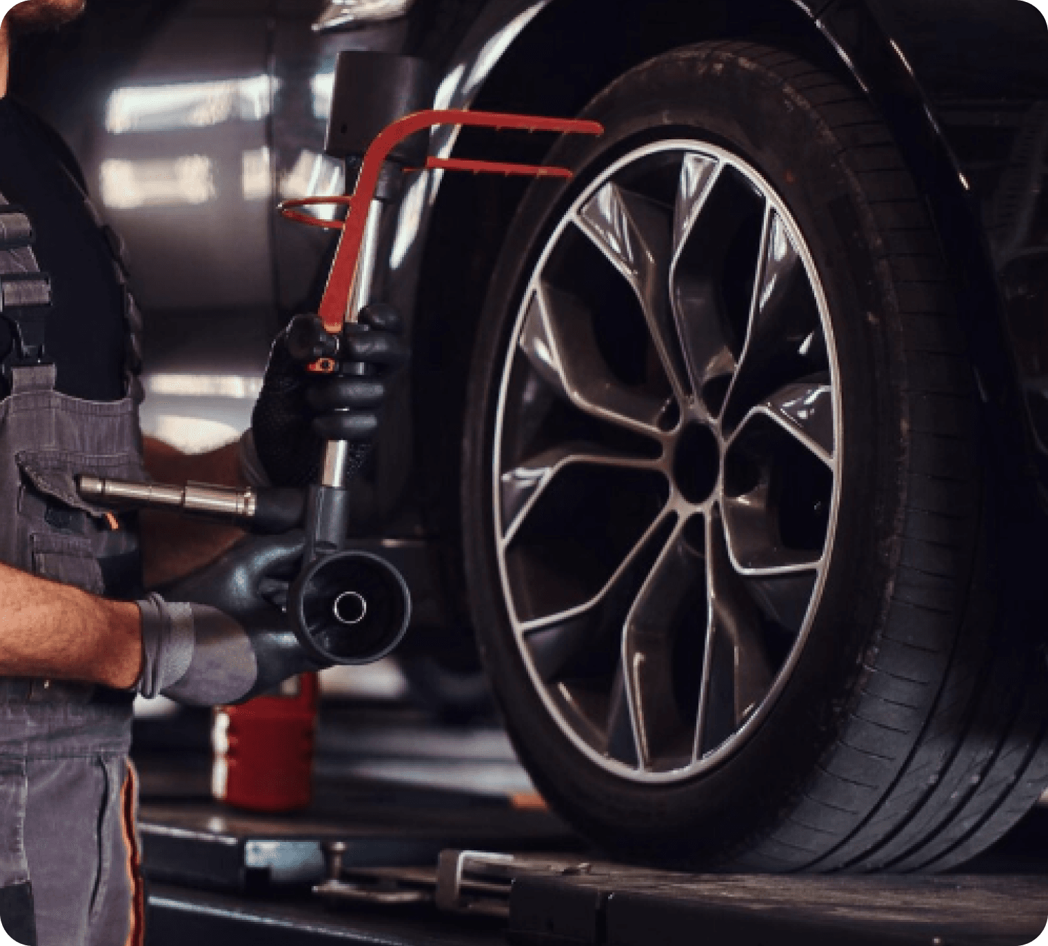Customer signing documents at a car dealership