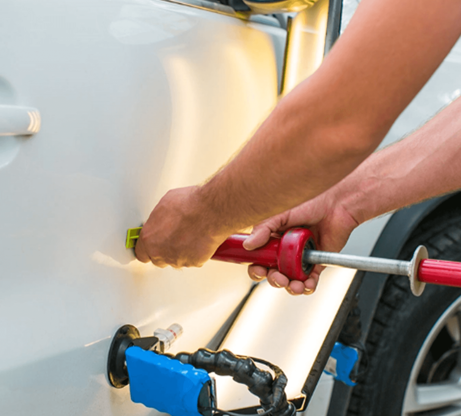 Person holding a phone with a car finance app