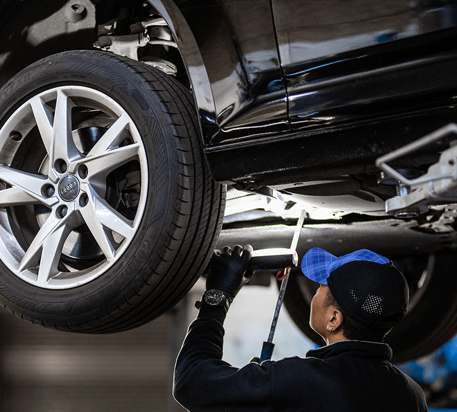 Customer signing documents at a car dealership